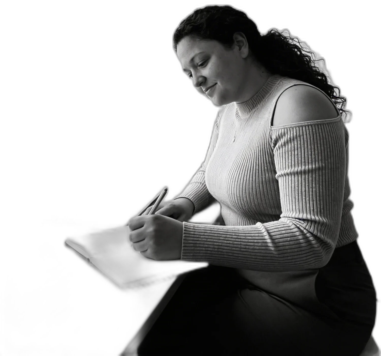 Priscilla working at her desk